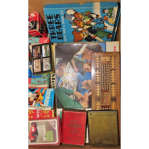 771 - A collection of Meccano in a small trunk together with a box of board games - snakes & ladders, ches... 