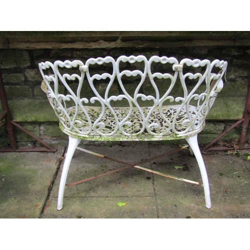 1002 - Small decorative cream painted cast aluminium garden bench, with open scrolled detail, 92cm wide