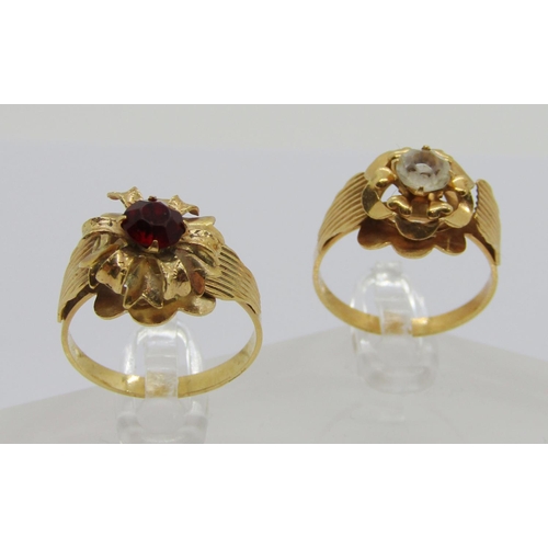 331 - Two Italian yellow metal floral design dress rings set with paste stones, stamped '750' sizes P/Q & ... 