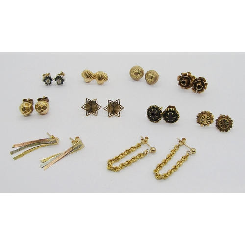 335 - Ten pairs of 9ct earrings of various design to include a tri-colour ribbon design pair, a pair in th... 