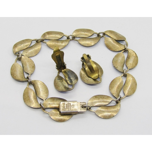 338 - Willy Winnaess for David Andersen; silver gilt leaf motif bracelet with blue enamel decoration and s... 