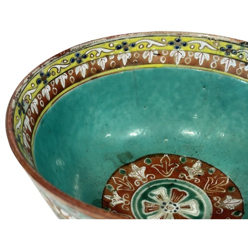 73 - A Sino-Thai Buddhist 'Bencharong' bowl, late Daoguang period, black-ground with enamel decorations (... 