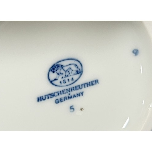 14 - A Hutschenreuther blue and white ‘Blue Onion’ pattern porcelain breakfast service for six to include... 