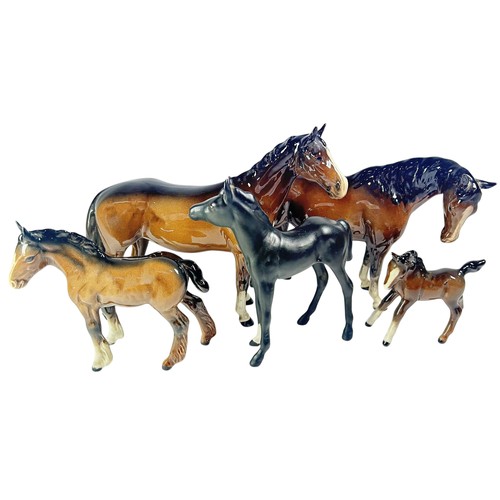 58 - A collection of Beswick horses and foals, in various sizes and poses (10)