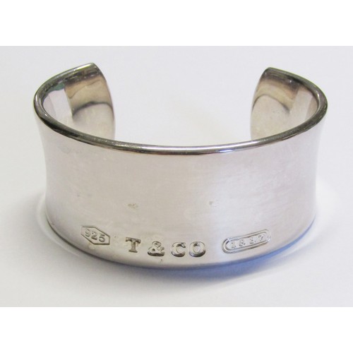 339 - Tiffany & Co. silver cuff bangle, stamped '925 T & CO 1837' to exterior and '2001 Tiffany & Co. 925'... 