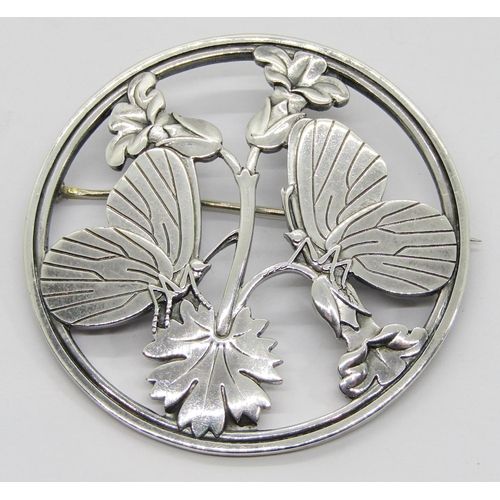 378 - Georg Jensen circular silver brooch designed by Arno Malinowski, depicting a pair of butterflies res... 