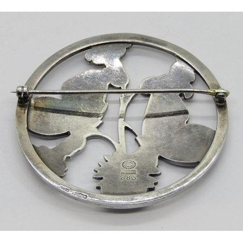 378 - Georg Jensen circular silver brooch designed by Arno Malinowski, depicting a pair of butterflies res... 
