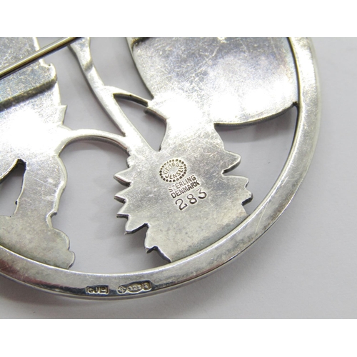 378 - Georg Jensen circular silver brooch designed by Arno Malinowski, depicting a pair of butterflies res... 