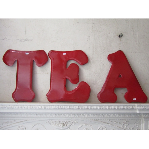 Three red enamel letters, which create T.E.A. or E.A.T. sign, each ...