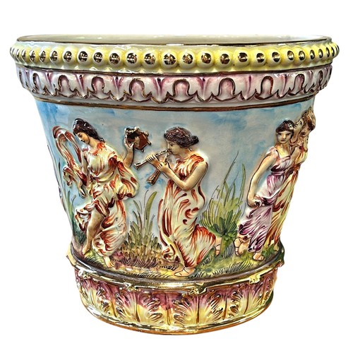 42 - A Capodimonte jardinière with relief moulded detail of dancing characters