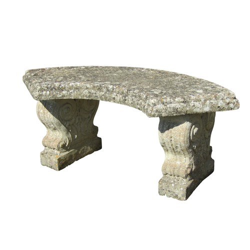 1055 - A weathered cast composition stone three sectional garden bench with crescent shaped slab seat raise... 