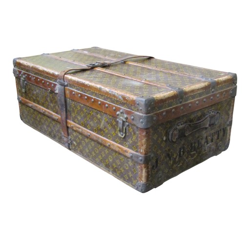 A Louis Vuitton travelling trunk, with lined interior and detachable tray, number 746175, with original leather strap, 33cm high x 90cm x 50cm