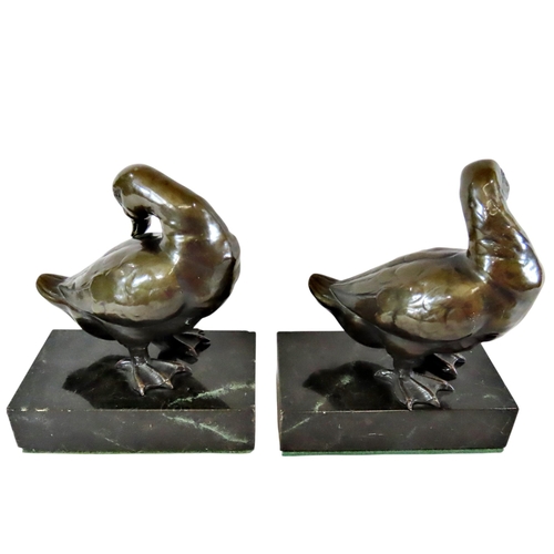 57 - A good pair of late 19th / early 20th century continental bronze ducks, each mounted on polished bla... 