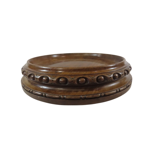 22 - A very large 19th century carved walnut display stand of circular form, 38.5cm diameter