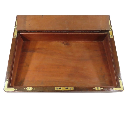 23 - A good William IV mahogany writing slope, with brass banded borders and corners, flanked with flush-... 