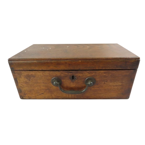 25 - A Victorian oak collector’s case with hinged cover and carrying handle containing a good collection ... 