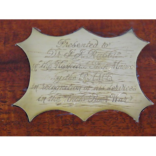 26 - Of First / Second World War / Boer War military / naval interest.

 An early 20th century mahogany c... 