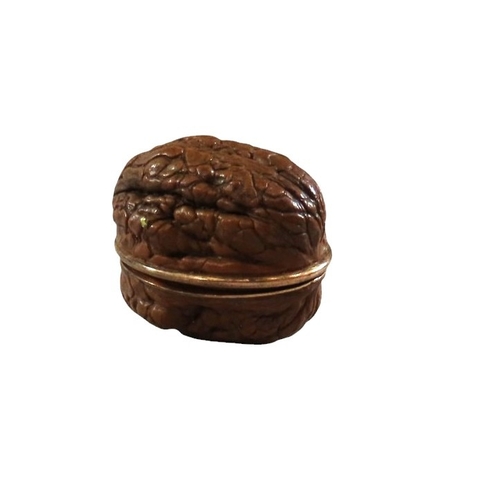 11 - A French natural walnut miniature sewing etui for a child or doll, gilt hinge mount, the lid interio... 