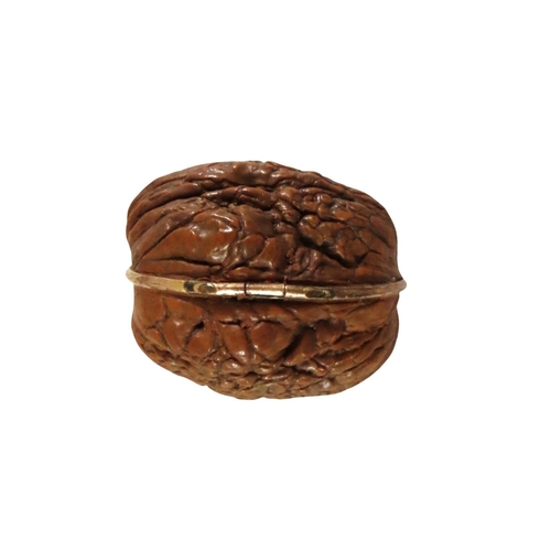 11 - A French natural walnut miniature sewing etui for a child or doll, gilt hinge mount, the lid interio... 