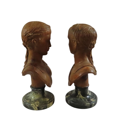 38 - an associated pair of decorative Italian carved limewood or pine busts after Roman emperors, likely ... 