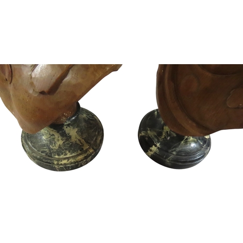 38 - an associated pair of decorative Italian carved limewood or pine busts after Roman emperors, likely ... 