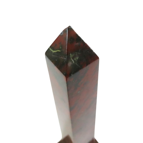 45 - A Grand Tour style polished red marble obelisk, on stepped square base, 37cm high