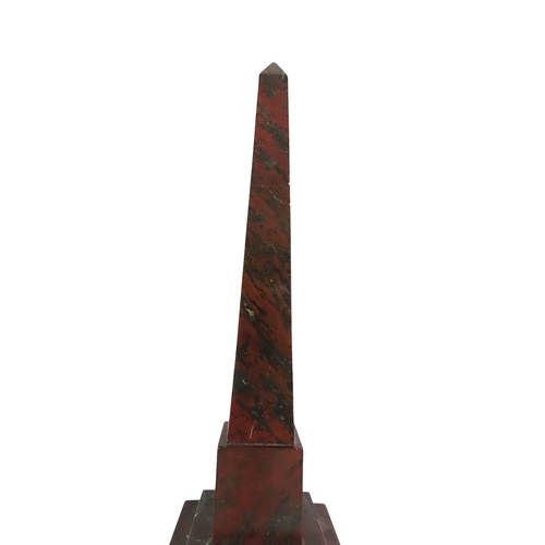 45 - A Grand Tour style polished red marble obelisk, on stepped square base, 37cm high