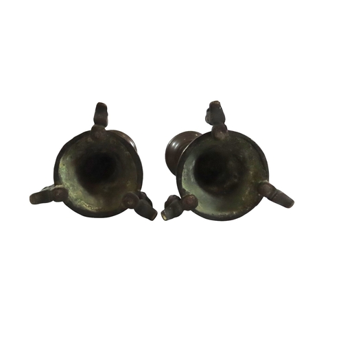 52 - A good pair of early continental ecclesiastical cast bronze pricket candlesticks, with flared bowls ... 