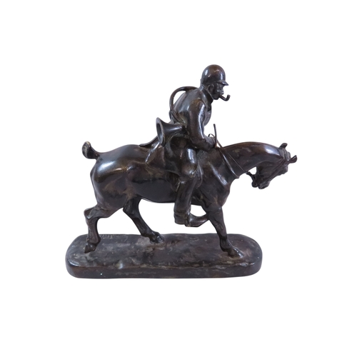 53 - After Gaston D'illiers (French, 1876-1932) bronze figure group, huntsman astride mount, smoking a pi... 