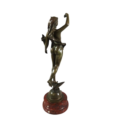 55 - A French Art Nouveau bronze figure,'Les Roses', modelled as a female nude, holding flowers, standing... 