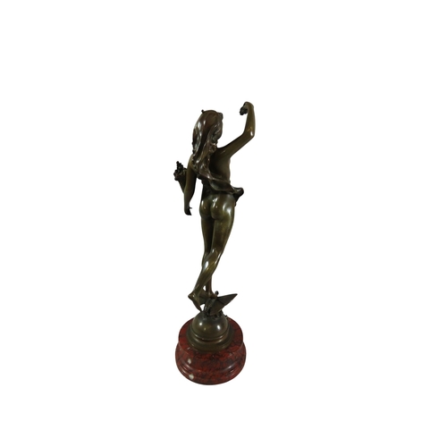 55 - A French Art Nouveau bronze figure,'Les Roses', modelled as a female nude, holding flowers, standing... 
