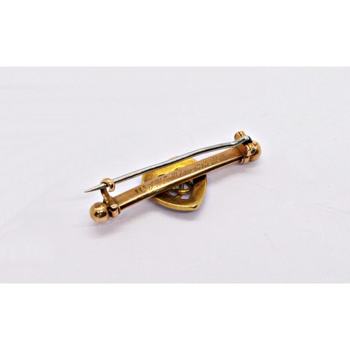 287 - A Victorian 15ct yellow gold bar brooch with loveheart motif bordered with pearls, centred with an e... 
