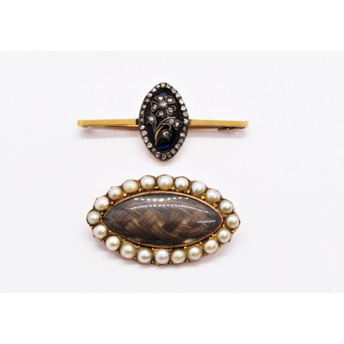 291 - An antique bar brooch mounted with a cobalt blue enamel with applied floral motif highlighted with r... 