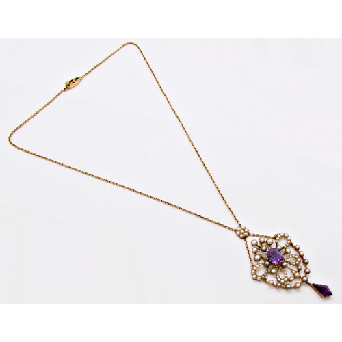 313 - A fine Edwardian seed pearl and amethyst set pendant, the central stone encircled within a hinged op... 
