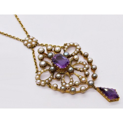 313 - A fine Edwardian seed pearl and amethyst set pendant, the central stone encircled within a hinged op... 
