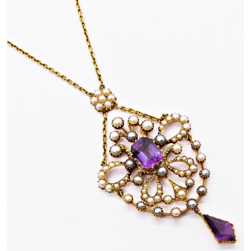 313 - A fine Edwardian seed pearl and amethyst set pendant, the central stone encircled within a hinged op... 