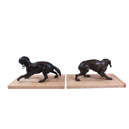 51 - A pair of 19th century French bronze animalier models of opposing dogs, with well patinated finish t... 