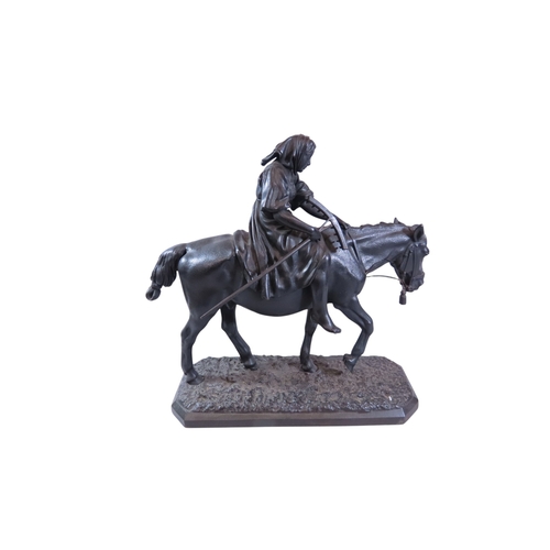 59 - After Nikolai Ivanovich Lieberich (1828-1883) Russian, a cast iron figure group of a peasant woman o... 