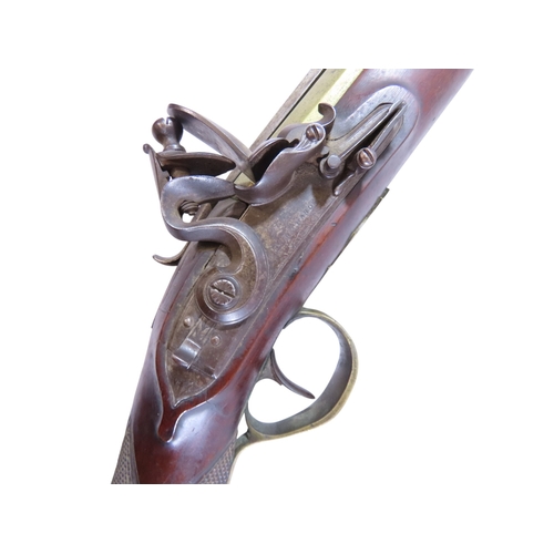 21 - An 18th century Richards flintlock blunderbuss with sprung catch-release locking bayonet, named lock... 