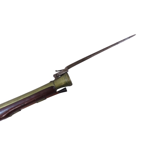 21 - An 18th century Richards flintlock blunderbuss with sprung catch-release locking bayonet, named lock... 