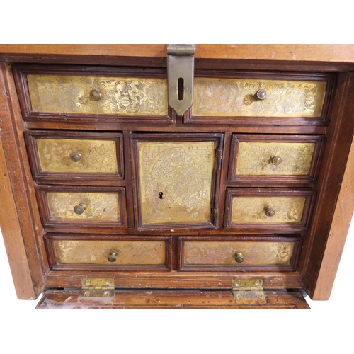 28 - A South German Augsburg-type walnut table cabinet, the exterior with simple boxwood stringing and ap... 
