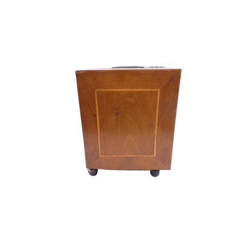 28 - A South German Augsburg-type walnut table cabinet, the exterior with simple boxwood stringing and ap... 