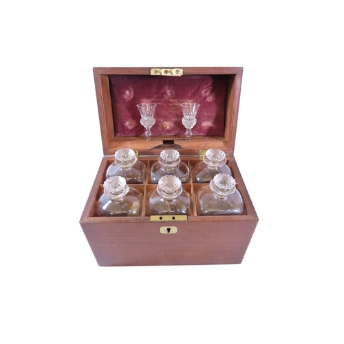 29 - A good George III mahogany spirit decanter box, the hinged cover fitted with a flush-fitting campaig... 