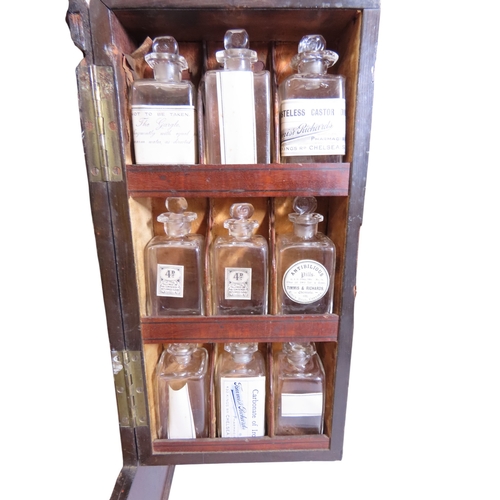 30 - A good early 19th century mahogany travelling apothecary’s cabinet of diminutive proportions, with f... 