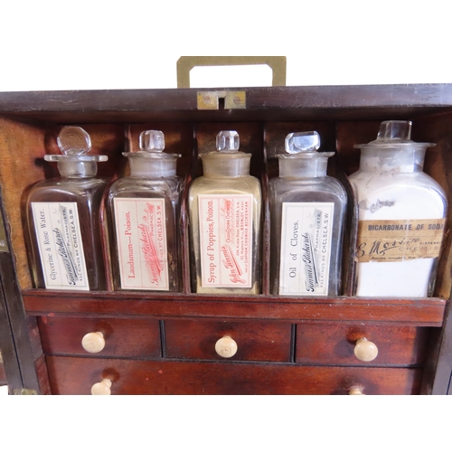30 - A good early 19th century mahogany travelling apothecary’s cabinet of diminutive proportions, with f... 