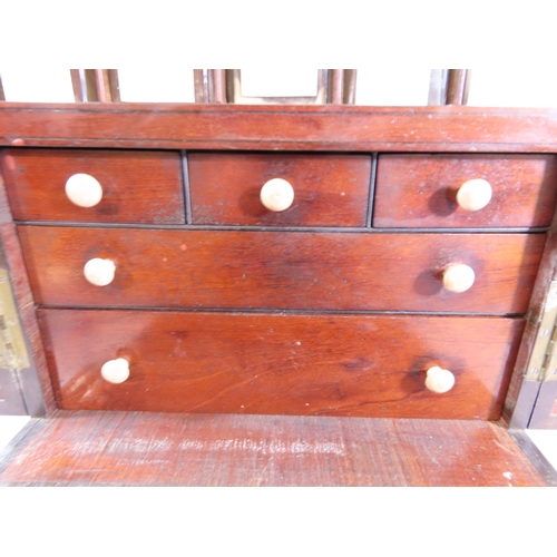 30 - A good early 19th century mahogany travelling apothecary’s cabinet of diminutive proportions, with f... 