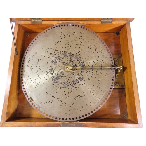 32 - A good large 19th century walnut cased table Polyphon, the hinged cover with stepped inlaid and cros... 