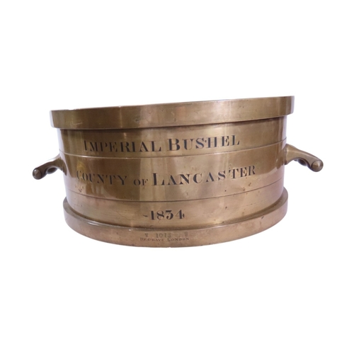 33 - A scarce and impressive William IV Imperial twin-handled bushel capacity measure, Lancaster, Dated 1... 