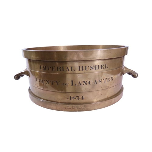 33 - A scarce and impressive William IV Imperial twin-handled bushel capacity measure, Lancaster, Dated 1... 