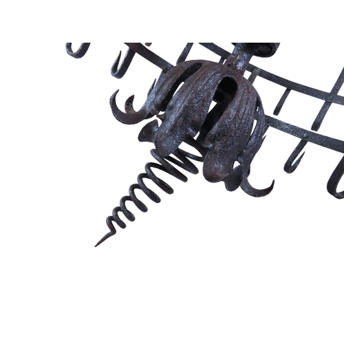 34 - An old continental two tier wrought iron game crown, fitted with 42 hooks over two tiers, 62cm diame... 